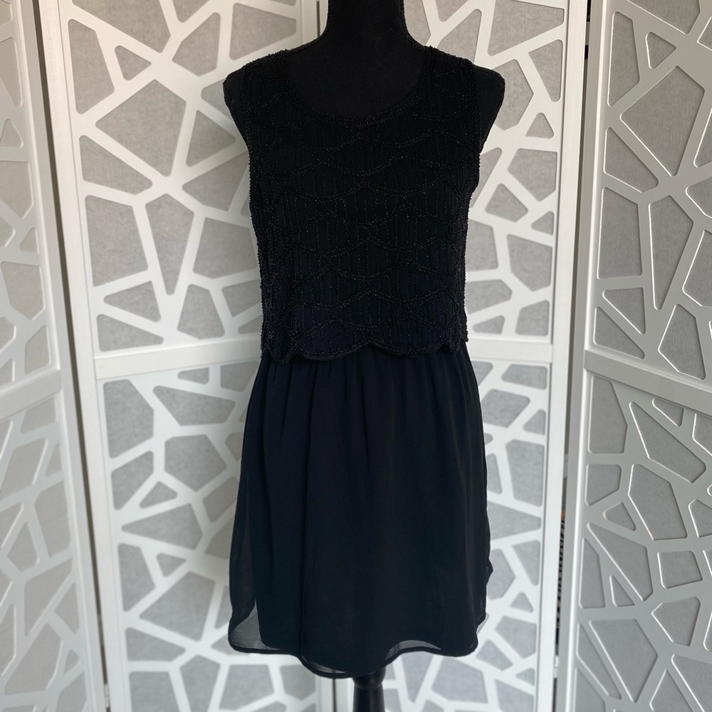 Dressy dress with sequin at the top. Worn once. Size S